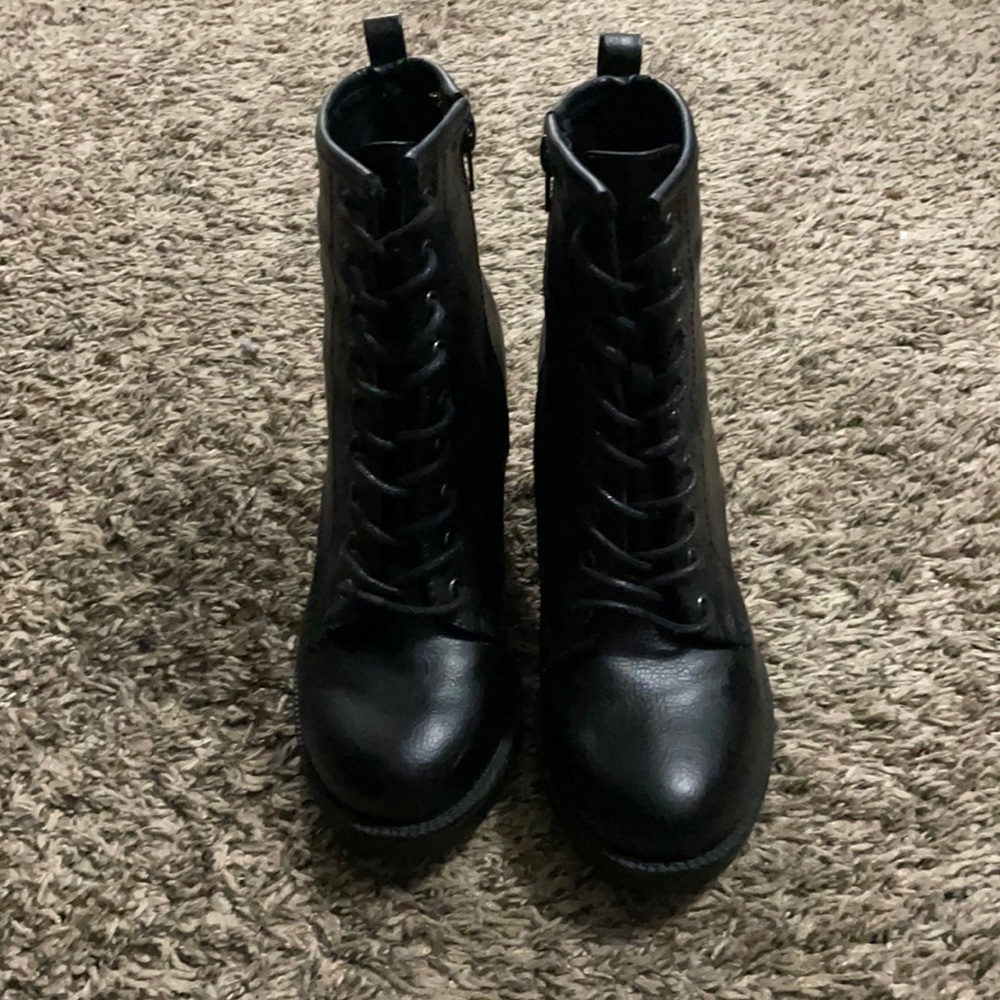 Black heels combat boots.
